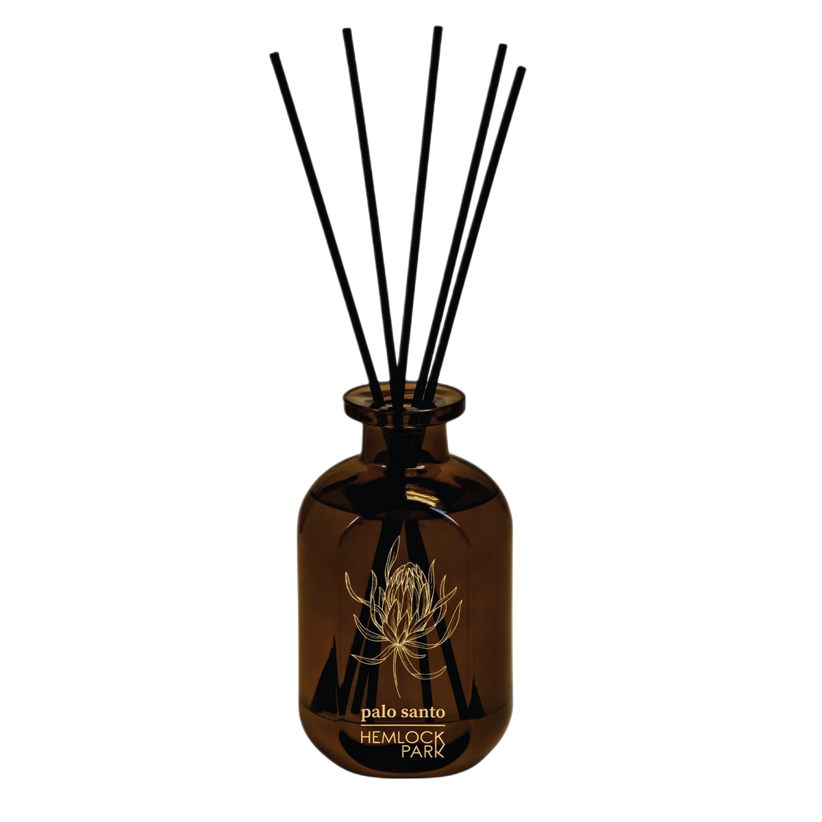 Hemlock Park Palo Santo reed diffuser in a brown glass bottle with black reeds and gold botanical illustration