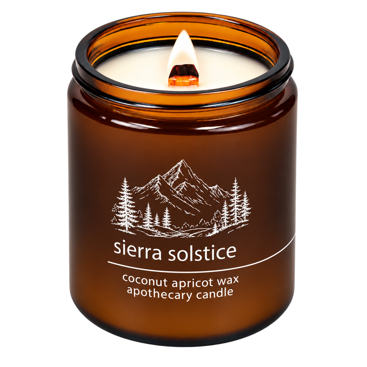 Hemlock Park Sierra Solstice apothecary candle in an amber glass jar with a burning wooden wick and mountain label.