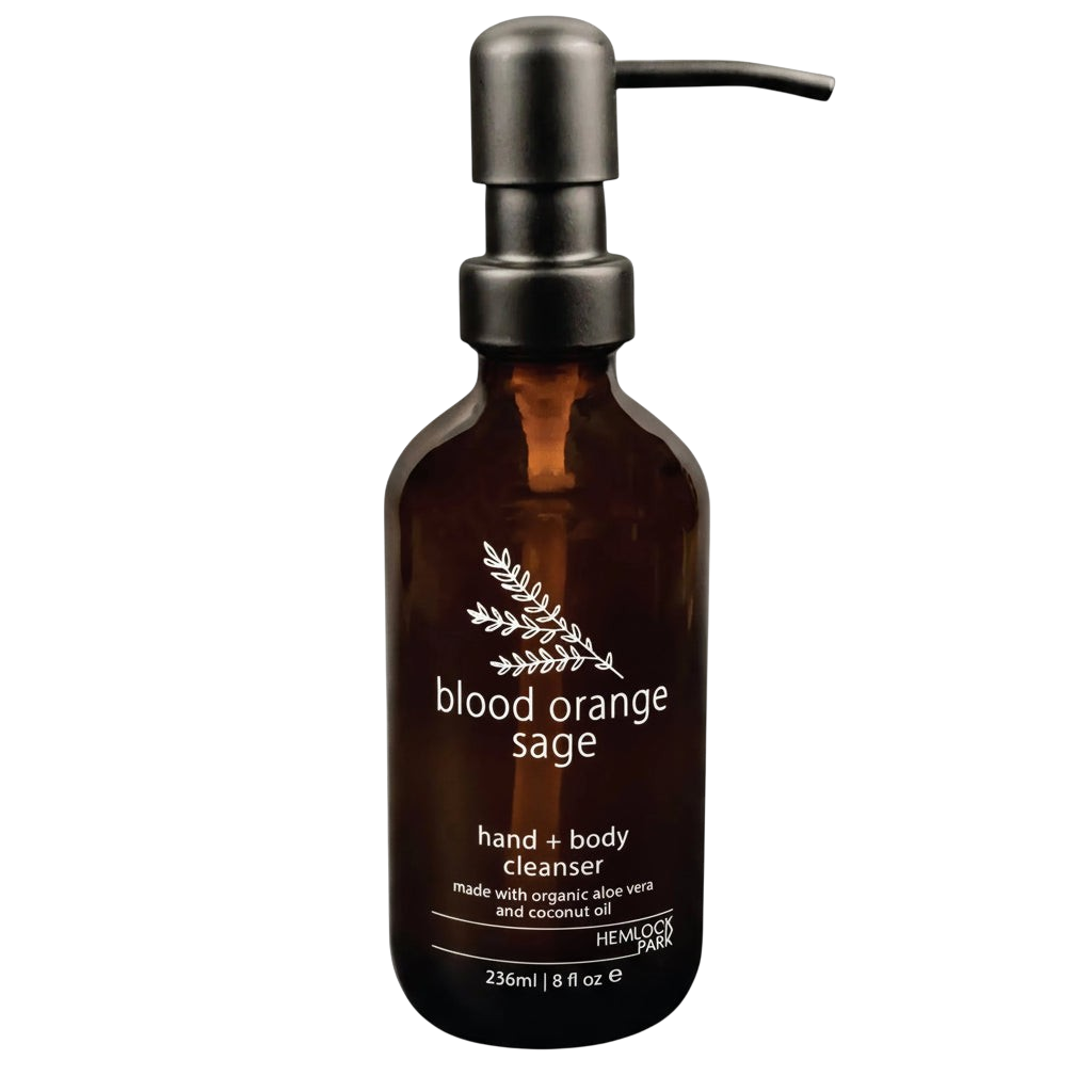 Hemlock Park Blood Orange Sage botanical hand and body cleanser in an amber glass bottle with a black pump dispenser.