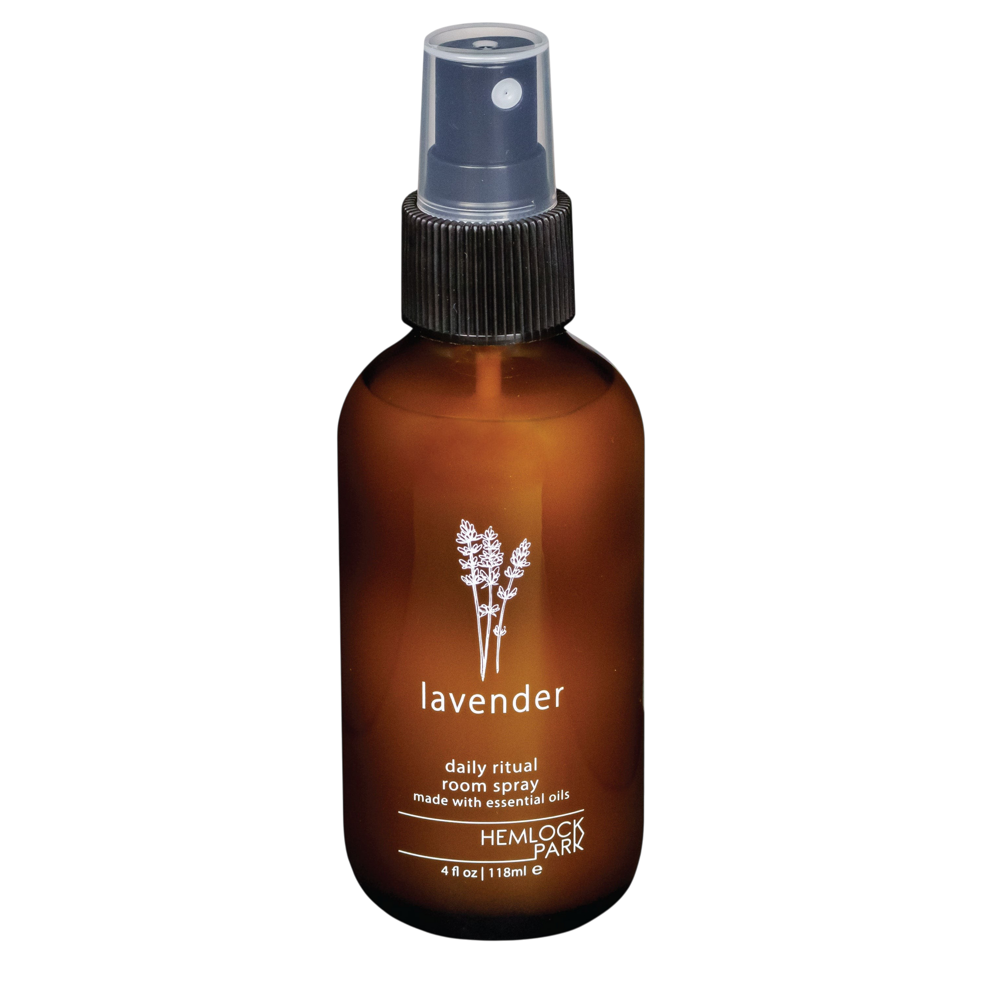 Hemlock Park lavender room spray in an amber glass bottle with a black spray nozzle and botanical label design.