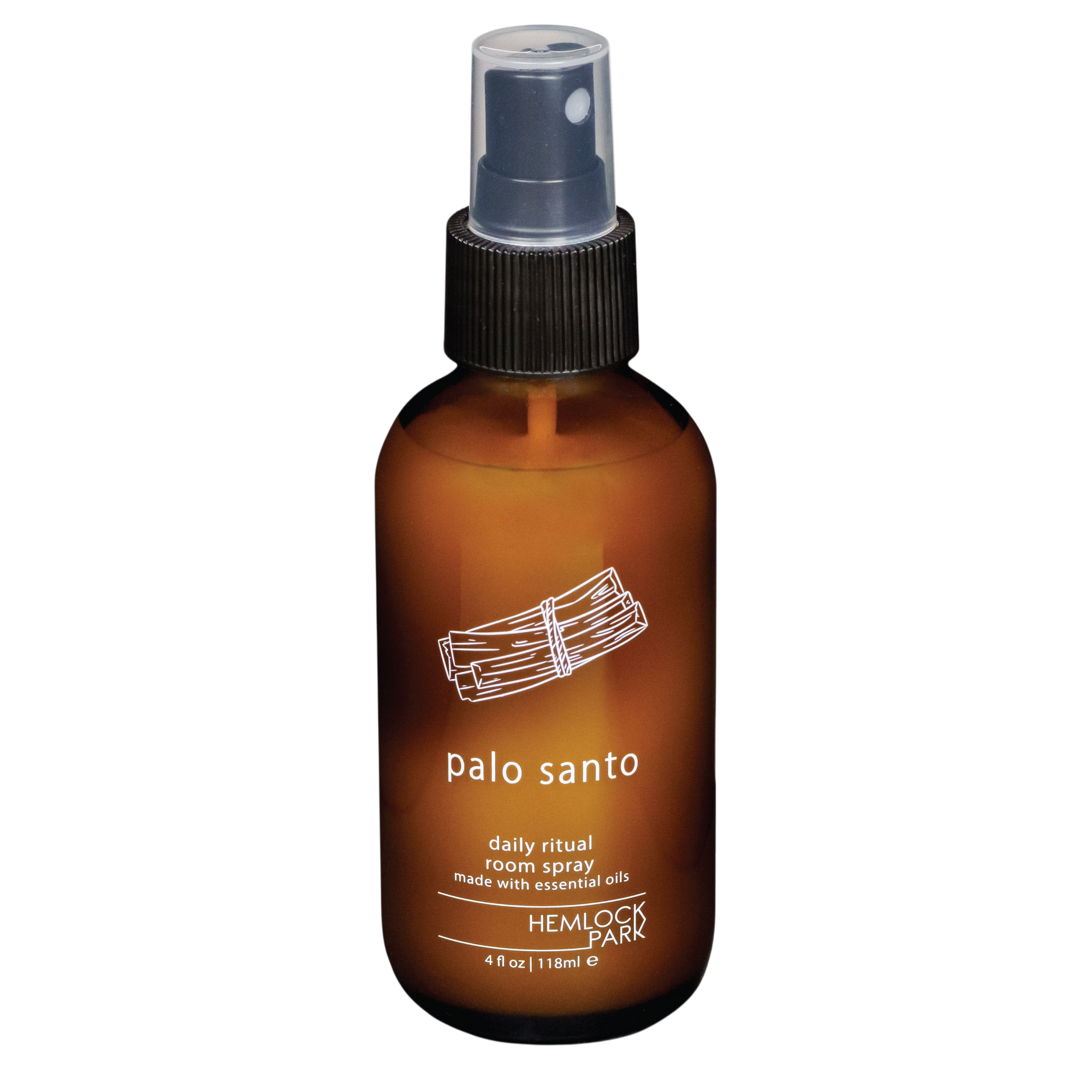 Hemlock Park Palo Santo room spray in an amber glass bottle with a black spray nozzle and minimalist white label.