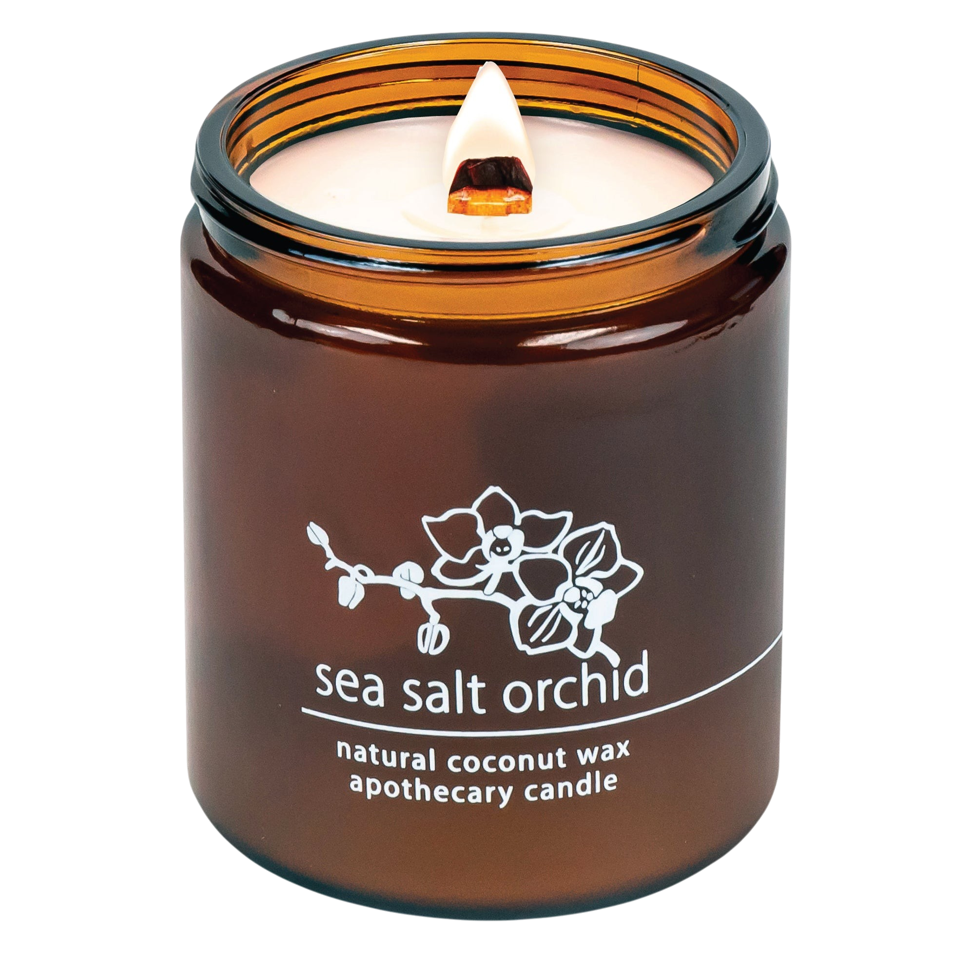Hemlock Park Sea Salt Orchid apothecary candle in an amber glass jar with a lit wooden wick and floral label.