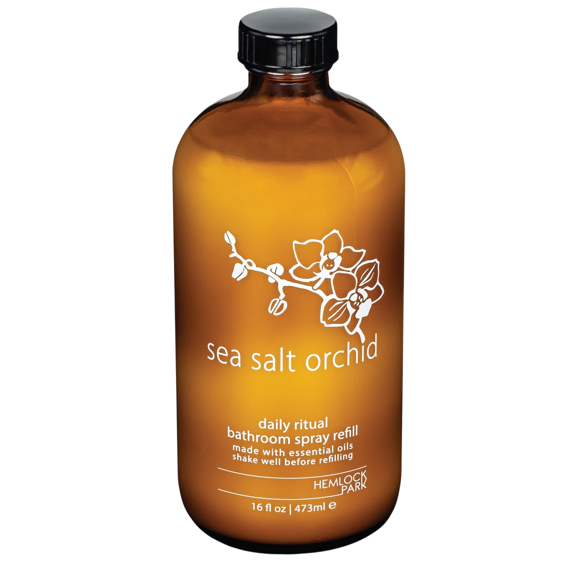 Hemlock Park Sea Salt Orchid room spray in an amber glass bottle with a black cap and white floral label design.