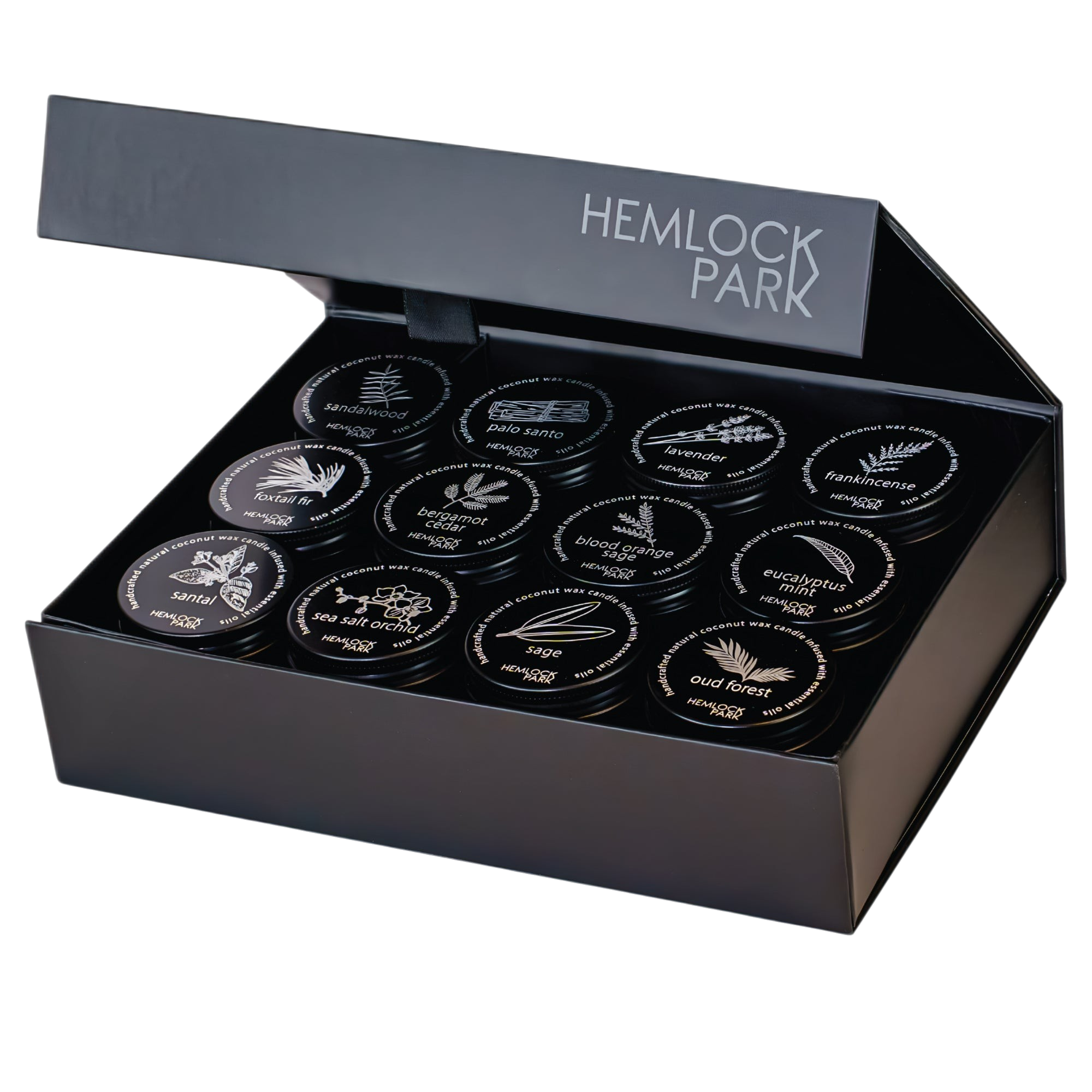 Hemlock Park travel candle set of 24 assorted scents in black metal tins inside a branded presentation gift box.